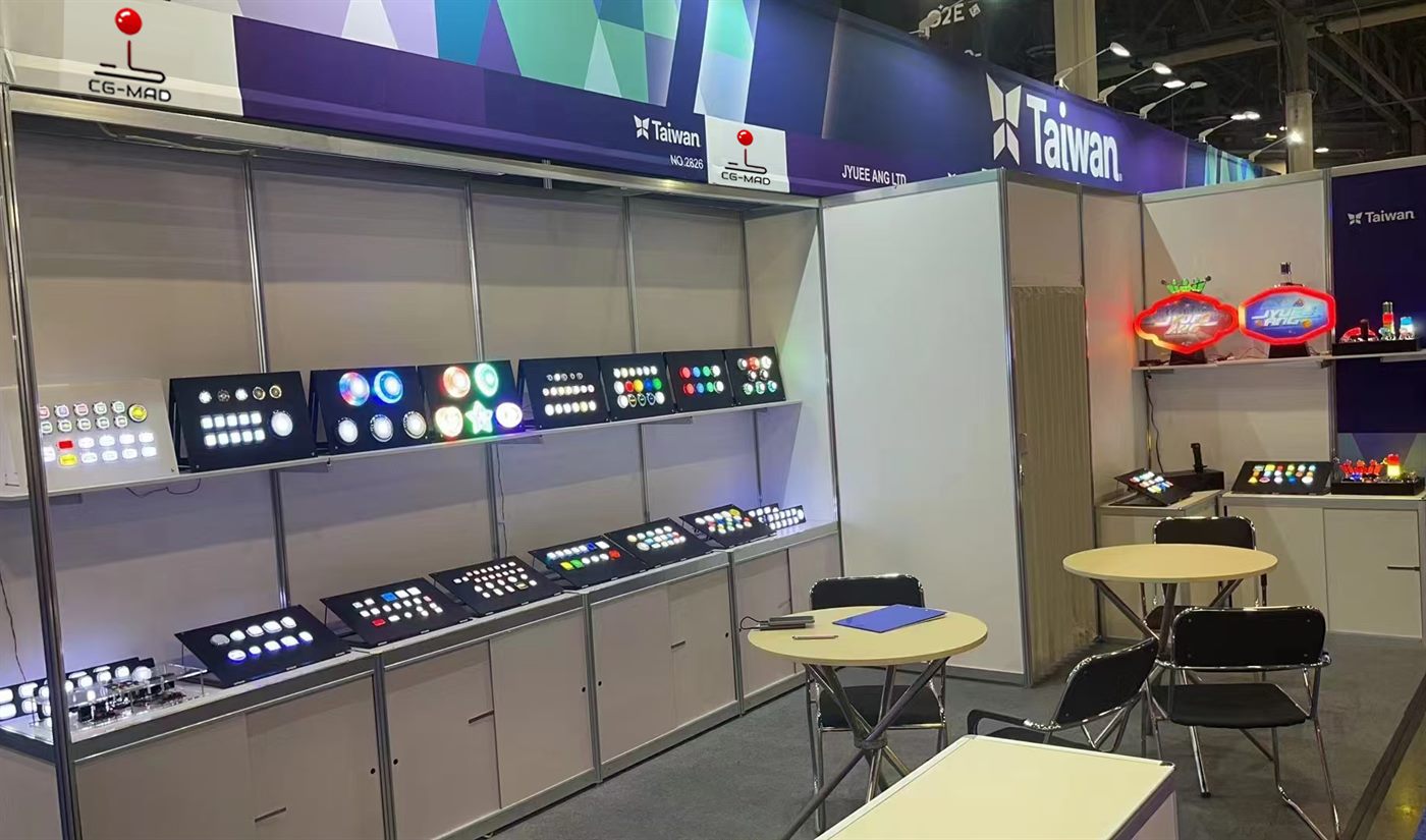 CGMAD stand at G2E Asia with lit button and joystick display panels